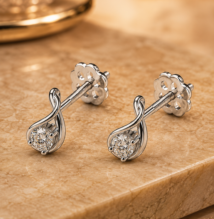 Diamond Stud Earrings in 14Kt Yellow Gold