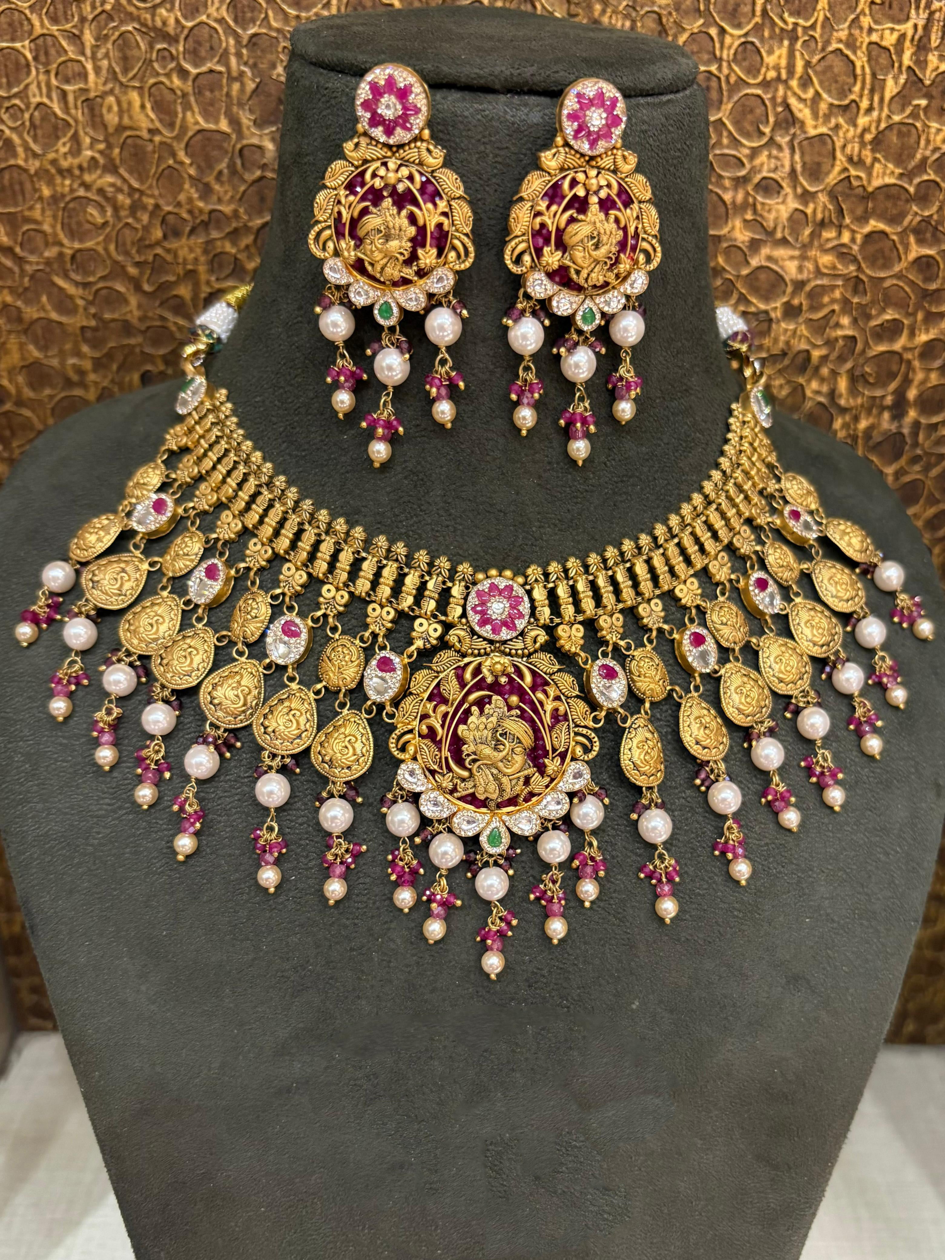 22Kt Gold Antique Ganesha Coin Guttapusalu Grand Choker Set with Pearl-Ruby Drops & Lakshmi Earrings