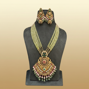22Kt Gold Grand Pendant Green Beaded Necklace Set on Mannequin