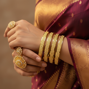 Model wearing 22Kt Diamond-Cut Starburst Gold Bangles