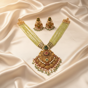 22Kt Gold Grand Pendant Green Beaded Necklace Set on Satin Cloth