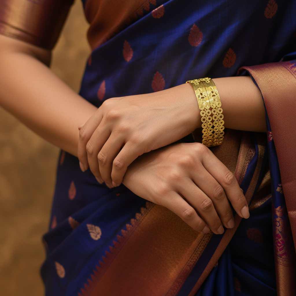 Model wearing 22Kt Wide Floral Coin Disc Gold Bangles