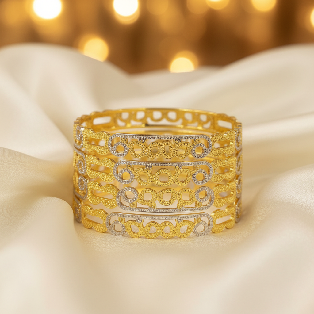 22Kt Two-Tone Oval Link Bangles on satin fabric