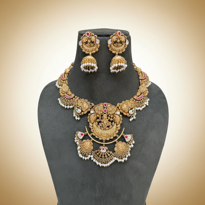 22Kt Gold Lakshmi Peacock Temple Necklace Set on Mannequin