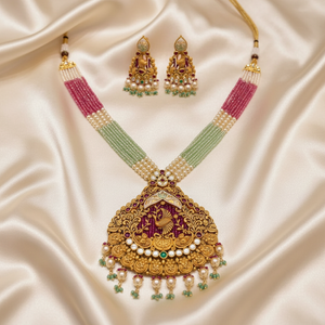 22Kt Gold Peacock Pendant Multi-Strand Necklace Set on Satin Cloth