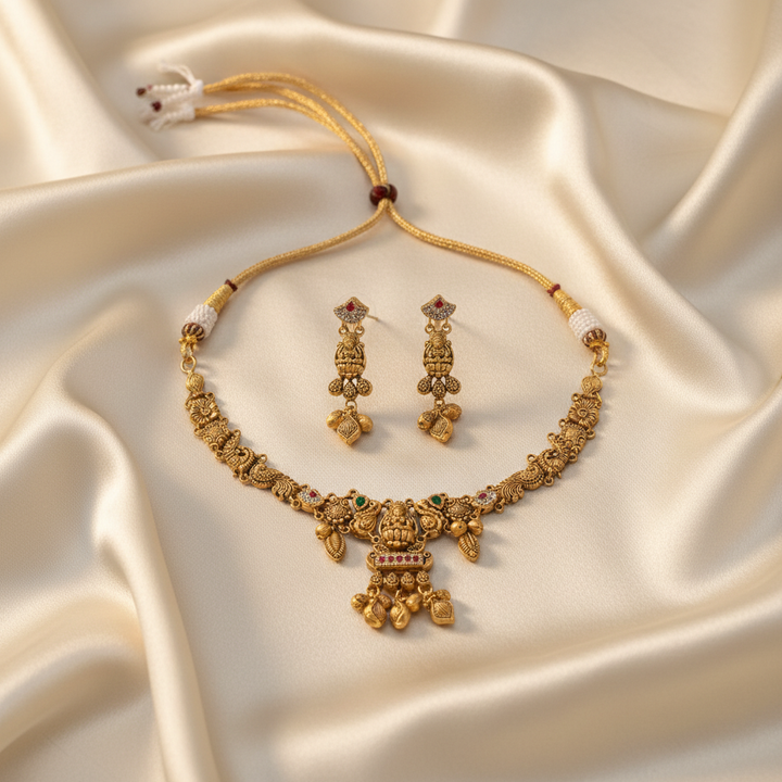 22Kt Gold Lakshmi Choker Necklace Set on Satin Cloth