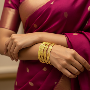 Model wearing 22Kt Wavy Filigree Gold Bangles