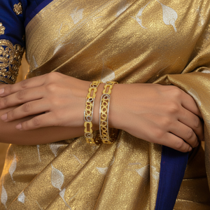 Model wearing 22Kt Two-Tone Oval Link Bangles