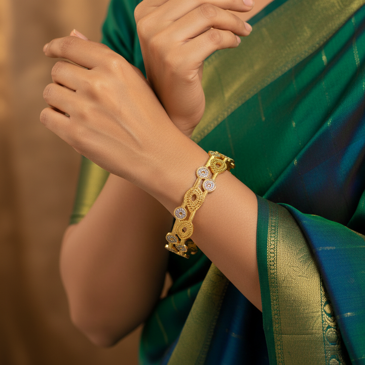 Model Wearing Coin Medallion Gold Bangles