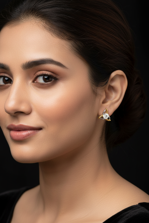 Model wearing diamond crescent stud earrings
